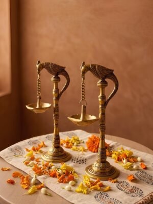 Shankh & Chakra Engraved Brass Stand Diyas (Pair)