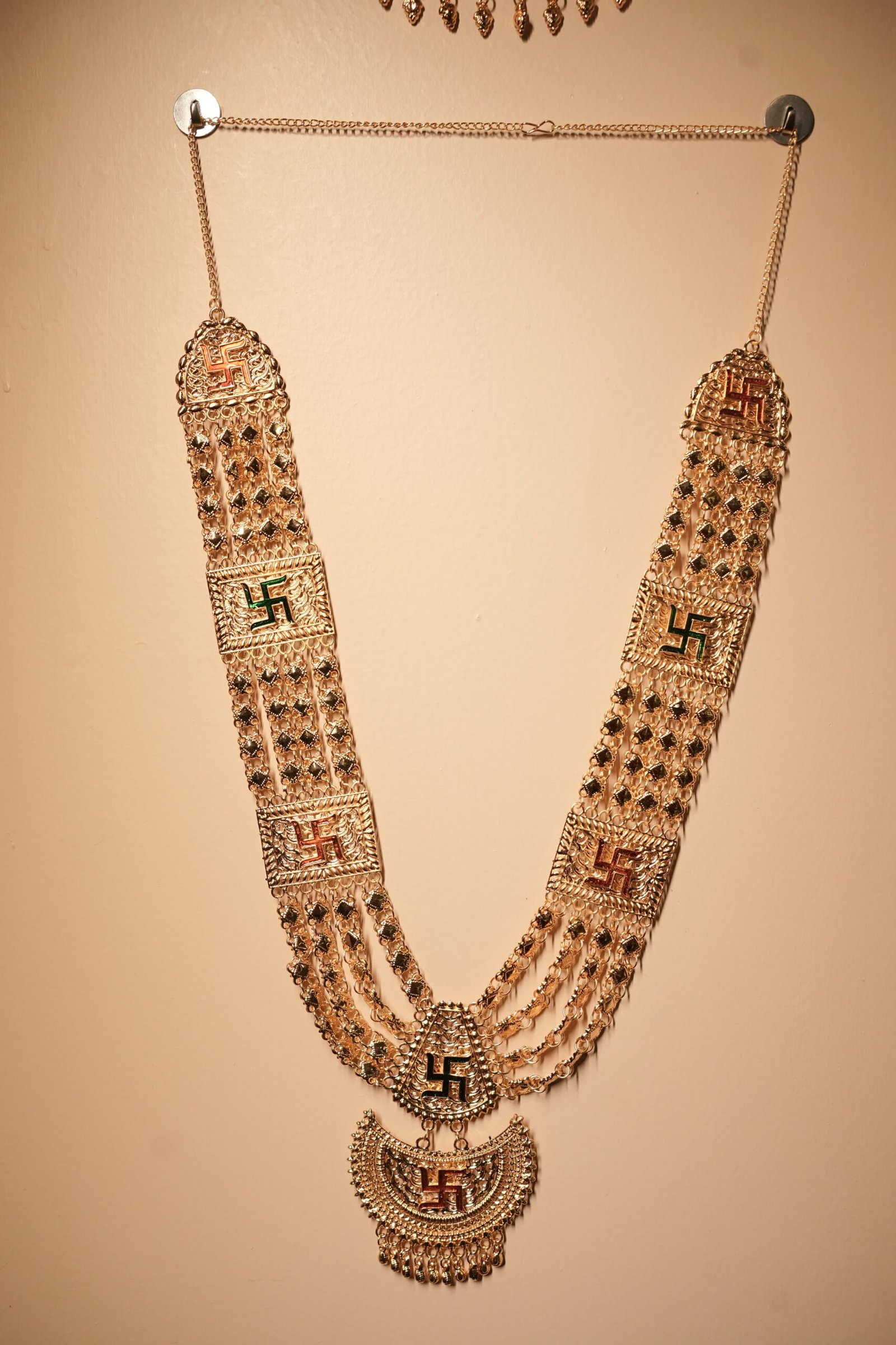 Traditional Gold-Tone Temple Necklace with Swastik Motifs